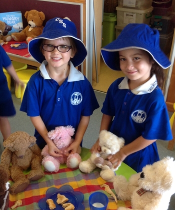 2 prep students haveing a teddy bear picnic